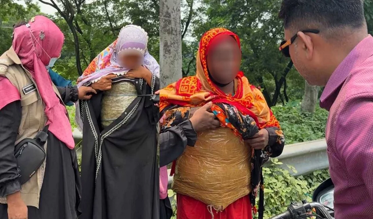 ২ নারীর পেটে-পিঠে মোড়ানো ছিল গাঁজা, চুক্তিতে নিচ্ছিলেন ঢাকায়